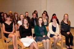 Group of 14 performers reciting poems from memory